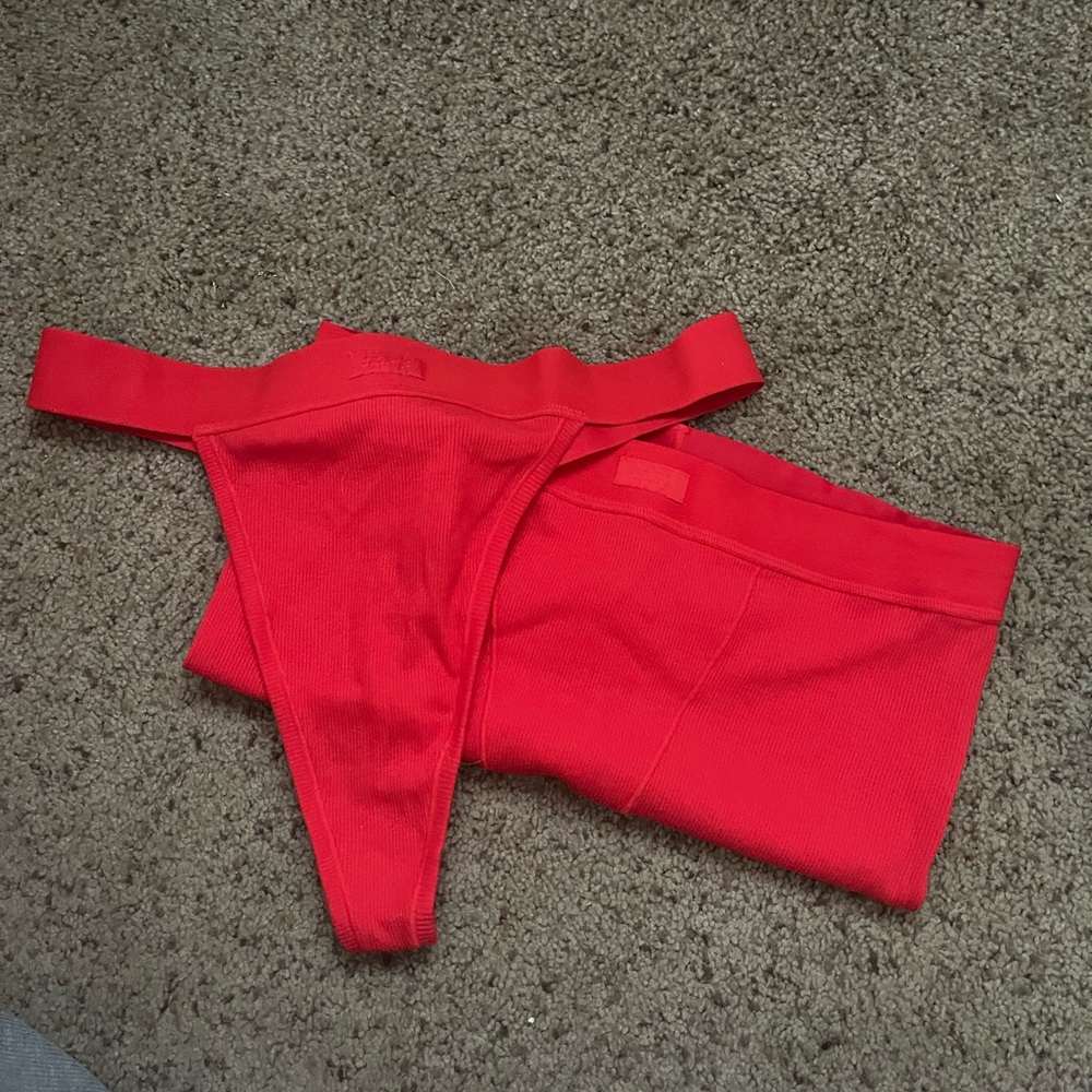 Skims 
Red
Size large